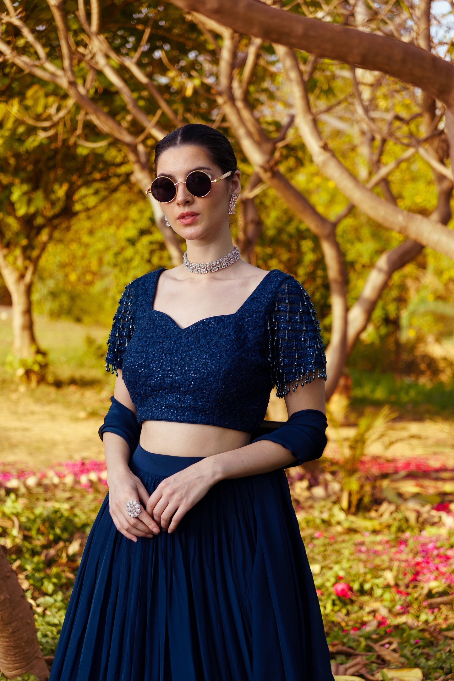 Midnight Blue Dori & Sequence work Blouse paired with a Flowy Skirt & Frill Dupatta