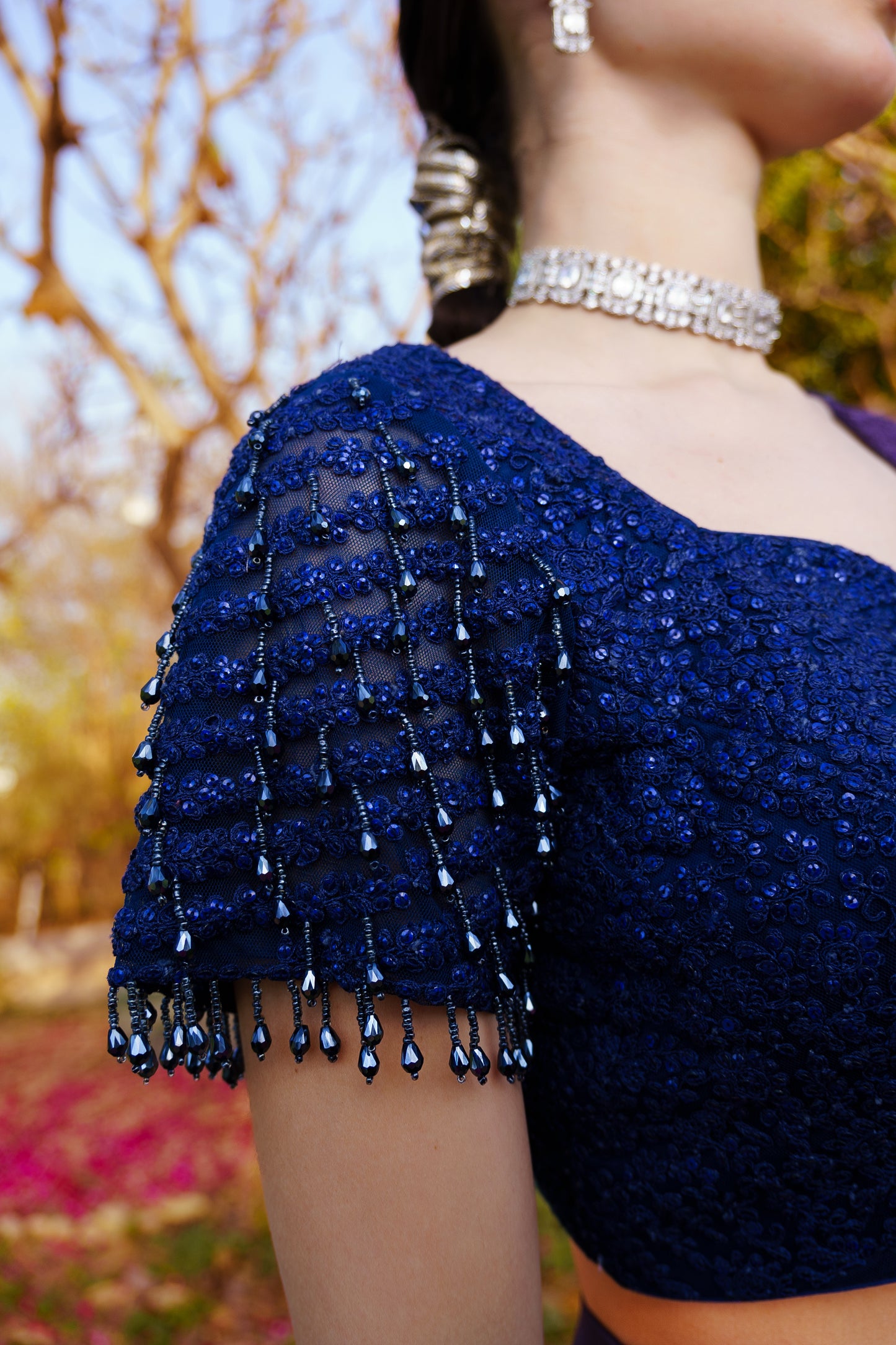 Midnight Blue Dori & Sequence work Blouse paired with a Flowy Skirt & Frill Dupatta